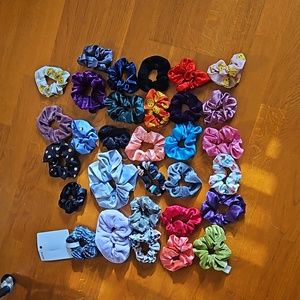 30 scrunchies, different designs, colours and textures.